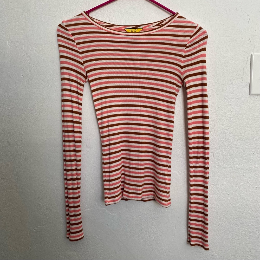 From Prince & Fox pink and brown long sleeve woman’s top.